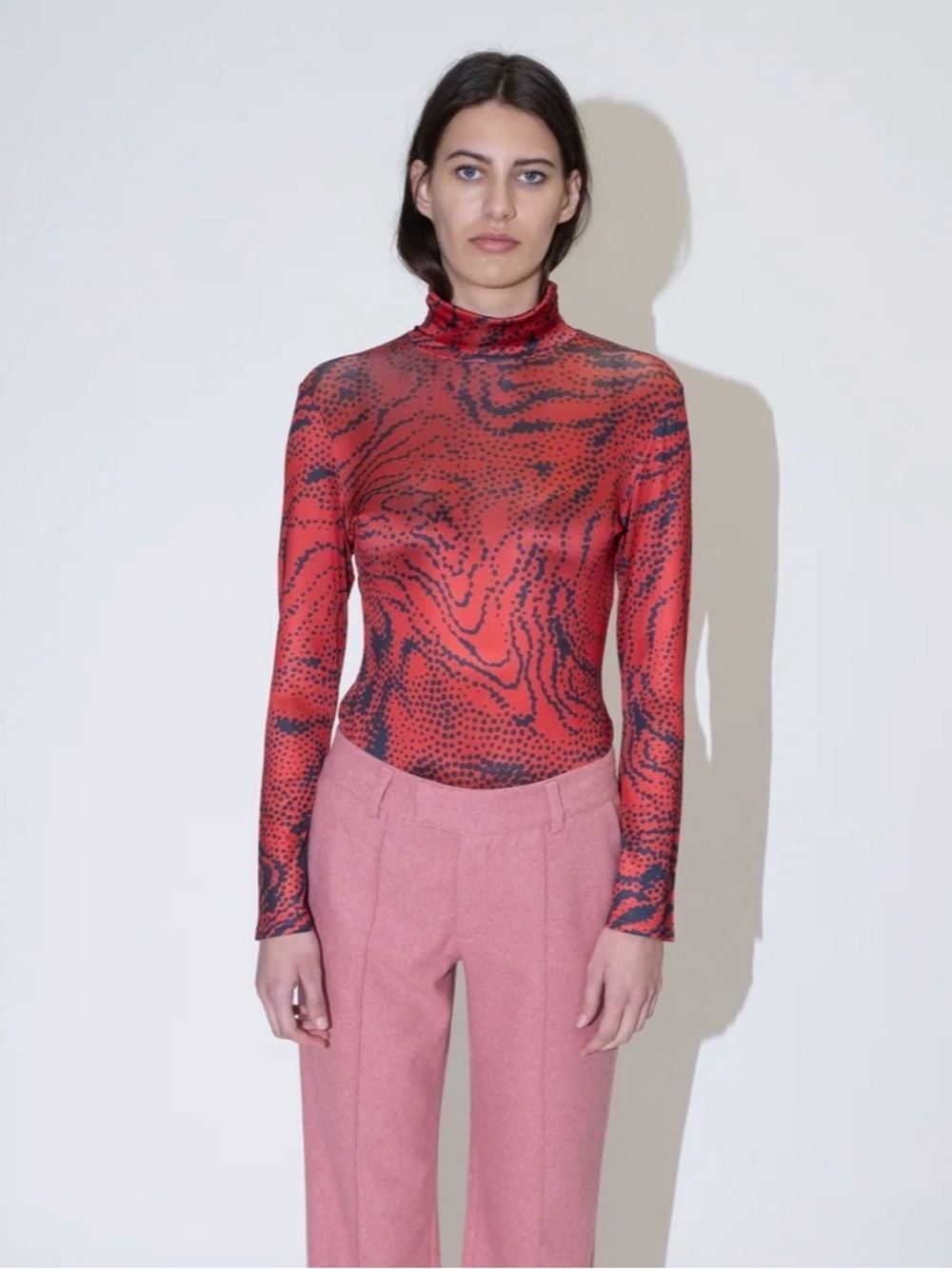 Untitled in Motion Orma turtleneck in zora red black swirl dot - S nwt
